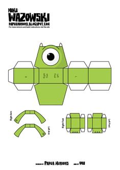 an origami paper toy that looks like a green bear with eyes and mouth