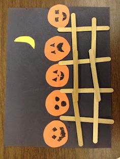 a piece of paper that has been cut out to look like pumpkins