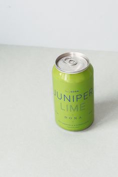 a can of limeade sitting on top of a white table