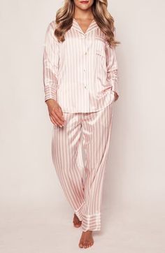 Cozy up in these luxuriously soft Mulberry-silk pajamas patterned in sweet stripes and designed with elevated details like button cuffs and piped edges. 31" inseam Top has front button closure; notched collar; long sleeves with three-button cuffs; chest patch pocket Pants have elastic waist; side-seam pockets 100% silk Hand wash, dry flat Imported Pink Silk Long Sleeve Sleepwear, Long Sleeve Sleepwear With Button Cuffs For Loungewear, Long Sleeve Sleepwear With Button Cuffs, Pajama Pattern, Like Button, Silk Pajamas, Notched Collar, Pocket Pants, Sleepwear Women