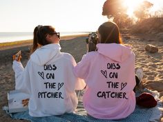 Matching hoodies with your bestie?  We're so here for it!  These retro Baseball Girlfriend Dibs on the Pitcher and Dibs on the Catcher back design hoodie sweatshirts are comfy, cozy, and oh so cute! Represent your fave ball player while you're in the bleachers, at school, at tournaments, or anywhere you go! Size up to wear as a tshirt dress or grab your regular size to wear with jeans and sneaks. However you style it, you'll love wearing it while you cheer on your favorite player! Thanks for sto Matching Hoodies For Best Friends Aesthetic, Best Friend Hoodie Ideas, Best Friend T Shirt Ideas, Best Friend Hoodies For 2, Matching Things For Best Friends, Matching Sweatshirts For Best Friends, Matching Hoodies For Best Friends, Matching Best Friend Hoodies, Bestie Sweatshirts