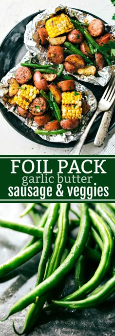 foil packet with sausage and veggies on it next to green beans, carrots and potatoes