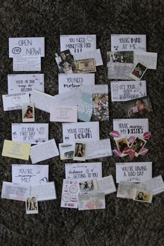 several pieces of paper with pictures and words on them sitting on the floor next to each other