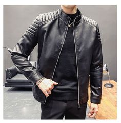 This Spring Motor Bomber Leather Jacket is super stylish and makes you look more elegant. The perfect compromise between casual and looking smart. One quick wearing can seamlessly take you to the next fashion level. Casual Fitted Leather Jacket For Office, Black Leather Jacket For Business Casual Winter Wear, Casual Leather Jacket With Stand Collar For Business, Black Leather Jacket For Business Casual In Winter, Casual Leather Jacket For Fall Business Casual, Casual Leather Jacket For Office, Elegant Spring Business Biker Jacket, Elegant Spring Biker Jacket For Business, Casual Business Leather Jacket With Long Sleeves