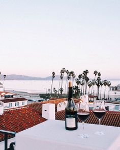 a bottle of wine sitting on top of a table