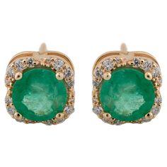 Introducing our elegant 1.62 Carat Emerald Diamond Halo Stud Earrings, where sophistication meets allure. Each earring features a dazzling 6mm round brilliant cut natural Brazilian emerald, evoking the lush greens of nature's landscapes. Encircling these gems are hand pave-set diamonds, totaling approximately 0.28 carats, adding a captivating sparkle to every glance. Crafted with precision, the emeralds are securely nestled in a rounded square curved halo setting, held by four delicately crafted Halo Stud Earrings, Rounded Square, Halo Setting, Halo Earrings Studs, Diamond Halo, Emerald Diamond, Halo Diamond, Jewelry Earrings Studs, Round Brilliant