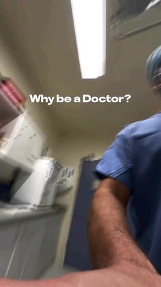 a man in scrubs is holding something up to his face with the caption, why be a doctor?