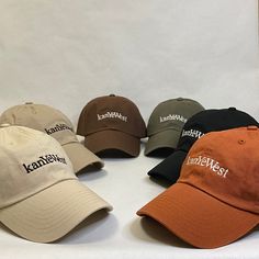 -Unstructured, six-panel, low-profile -Self-fabric tri-glide buckle closure - antique brass -100% cotton High Quality - We make sure to use the highest quality hat and stitching on the market. Made In House - All of our orders are made in house, meaning we take the time to make your order as we receive it. We make sure to never send anything out that we wouldn't wear ourselves! Adjustable - Our hats are adjustable so you don't have to worry about sizes. With the adjustable strap, it has never be Caps Product Photography, Kanye West Hat, Cap Aesthetic, Polo Cap, Trendy Caps, Hat Aesthetic, Custom Trucker Hats, Cap Fashion, Aesthetic T Shirts