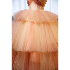 Step into sophistication with the Elegant Champagne and Pink Layered Tulle Ruffle Dress. This strapless evening dress features a luxurious corset back, offering both comfort and style for any special occasion. The combination of champagne and pink hues enhances the dress's romantic allure, making it perfect for making a memorable entrance. Layered Tulle Ruffles: Multiple layers of champagne and pink tulle create a stunning, voluminous effect, adding a touch of fairy-tale elegance. Strapless Cors Glamorous Strapless Tulle Ball Gown, Evening Strapless Dress With Boned Bodice And Tulle, Evening Organza Corset Dress With Ruffles, Evening Strapless Ball Gown With Ruffles, Gala Strapless Tulle Dress With Ruched Bodice, Luxury Strapless Tulle Dress With Ruched Bodice For Gala, Strapless Party Ball Gown With Ruffles, Strapless Tulle Ball Gown For Formal Events, Ruffled Corset Dress For Gala And Prom Season