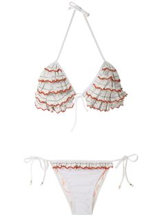 White and orange ruffled triangle bikini set from Amir Slama featuring a triangle top with adjustable straps for added comfort, no bra support, spaghetti straps, layers of frills, decorative perforations, a back tie fastening, a brazilian style bottom, side tie fastenings, contrasting crochet appliqués and a mid-weight stretch fabric. This item fits small, please select the next size up. Swimwear must be tried on over your own garments. This item provides a medium body coverage. White Ruffled Straps Swimwear For Poolside, White Ruffled Triangle Top Swimwear, White Triangle Top Swimwear With Ruffles, Bra Support, Brazilian Style, Versace Outfit, White And Orange, City Dress, Support Bras