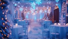 a room with tables and chairs covered in snowflakes, lit up by candles