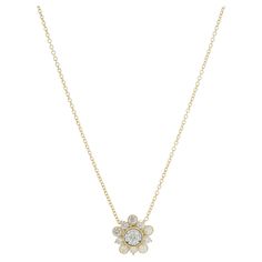 Designer: custom design Material: 14K yellow gold Diamond: 11 round brilliant cut = 0.52cttw Color: G Clarity: SI1 Dimensions: necklace measures 18-inches in length Weight: 3.22 grams Diamond Flower Necklace, Diamond Flower, Flower Necklace, Round Brilliant, Diamond Jewelry, Gold Diamond, Jewelry Necklace Pendant, Jewelry Necklaces, Custom Design