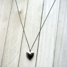 "A stainless steel heart locket hangs from a vintage stainless steel chain to make this simple and easy to wear necklace. The locket measures 25mm, a little under 1\". Choose length at checkout. 16\". 18\". 20\". 22\". 24\". Please excuse any reflections in the shiny surface of the heart. I tried my best to hide! More heart jewelry can be found here: http://etsy.me/1Stzj2o To see more of my handmade jewelry in my Etsy shop, click this link: WearYourWild.etsy.com All jewelry comes nestled in recy Hag Stones, I Tried My Best, Heart Locket Necklace, Heavy Chain, Kraft Gift Boxes, Wear Necklaces, Heart Locket, Locket Necklace, Heart Jewelry