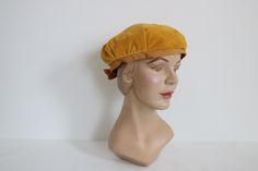 Vintage Mustard Yellow Velvet 1960s Beret Tami Hat Vintage Hat Women's Hat Headpiece Cocktail Hat Tea Party Hat Retro MCM Hat 📏MEASUREMENTS & DETAILS 🔍 Label/Era: - / 1960s Size: One Size Fits Most. Measures approximately 20.5" around on  inside grosgrain trim. Lined in mustard yellow acetate fabric. Vintage Condition: Excellent vintage condition  ★ Shop more lovely hats here: http://www.etsy.com/shop/thevintagemistress?section_id=5922199 ★ Visit the Shop: http://www.etsy.com/shop/TheVintageMistress?ref=si_shop ★ Please read all the information in my "FAQs" sections as it applies to orders placed with my shop. Due to monitor differences, actual colors may vary from what appears online. Acetate Fabric, Hat Tea Party, Tea Party Hats, Yellow Hat, Cocktail Hat, Vintage Hat, Party Hat, Hats Vintage, Mustard Yellow