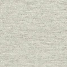 an upholstered fabric textured with white and grey colors, suitable to use as wallpaper