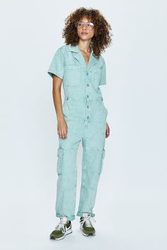 Healing touch. All-in-one outfitting, expertly realized in our best selling jumpsuit silhouette. Designed for a relaxed fit, with a button up bodice and waist for adjustable coverage and fit options. Aloe Snow is a cool toned aqua hue adorned with flap side pockets on the lower legs and cargo inspired styling notes. 100% Cotton Imported Cargo Jumpsuit, Healing Touch, Best Swimwear, Boutique Tops, Cool Tones, Romper Pants, Denim Jumpsuit, Dress Romper, Mini Fashion