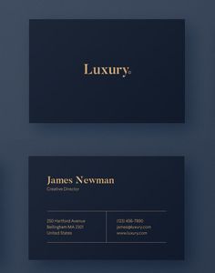 two business cards with gold foil on them, one is black and the other is dark blue