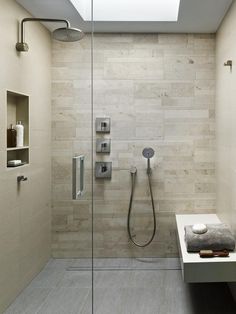 an image of a bathroom setting with shower and sink in the middle, including toilet