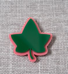 Letters aren't for every occasion, so when you want to represent your organization without 'representing' your organization, this pin will get the job done. This 3 inch pin is a nod to your sorority without taking away from the occasion or your outfit. Aka Door Signs, Alpha Kappa Alpha Sorority Accessories, Alpha Kappa Alpha Desk Accessories, Alpha Kappa Alpha Sorority Accessories Pearl Numbers, Sorority Pins, Alpha Kappa Alpha, Lapel Pin, Pin Badges, Lapel Pins