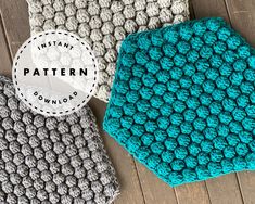 three crocheted potholders sitting on top of a wooden floor next to each other