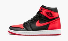 The Air Jordan 1 High “Satin Bred” is a special edition of the iconic colorway reconstructed with a satin upper. Inspired by the classic Air Jordan “Flight Suit” warm-up outfit worn by Michael Jordan in 1985, the satin construction takes the legendary black and red colorway of the AJ1 to new heights with a glowing sheen. Other premium details include a white leather quilted sockliner, embroidered "Wings" logos on the heels, and metal lace eyelets. The Air Jordan 1 High “Satin Bred” received a sp Balenciaga Speed Trainer, Jordan Grey, Buy Jordans, Satin Shoes, Jordan 1 High Og, Air Jordan 1 Retro High Og, Air Jordan 1 Retro High, Yellow Shoes, Air Jordan 1 High