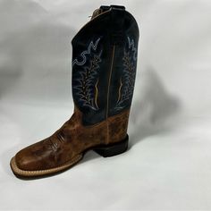 Old West - Men's Broad Square Toe Dark Brown/ Blue Leather Cowboy Boots-Size 6.5 Big Kid M Constructed From High Quality Leather And Man-Made Materials,Old West Boots Are Made To Last These Cowboy Boots Feature Leather Materials, Leather Insole, 9in Shaft Height And Much More Listed In Our Bullet Points Below. Wear These Cowboy Boots With Pride! Leather Materials Leather Insole 9in Shaft Height Broad Square Toe Rubber Outsole Pull Tabs Natural Welt Rubber Outsole 6-Row Fancy Stitch Hand Corded Medallion Fully Leather Lined 1.58in Heel Height Blue Leather Boots With Reinforced Toe, Blue Leather Boots For Ranch, Old West Boots, West Boots, Bullet Points, Leather Cowboy Boots, Boys Boots, Walker Boots, Old West