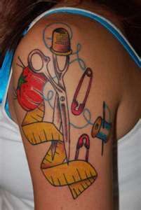 a woman with a tattoo on her arm has scissors, an apple and other items