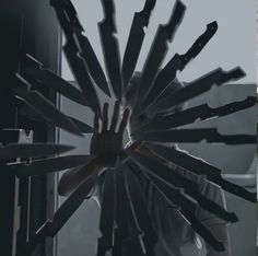 a person holding their hand up in front of a large clock made out of knives