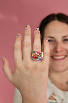 Eeeek how fun is this ring?! This cutie is the PERFECT pop of color! The whole ring is transparent + chunky, with a wide flat top that contains multicolor pieces that give off sea-glass vibes for sure! It's such a fun fashion ring + could be worn anywhere or with anything since it has so many colors!! This ring is a size 8 + is NOT adjustable, so be sure to know your ring size before purchasing! - Size 8, not adjustable Playful Multicolor Rings Perfect For Gifts, Playful Multicolor Rings For Gifts, Trendy Multicolor Resin Rings, Playful Handmade Multicolor Rings, Fashion Ring, Fun Fashion, Flats Top, Sea Glass, Class Ring