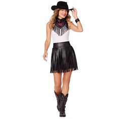 a woman in a black and white outfit is wearing a cowboy hat, fringe skirt and boots