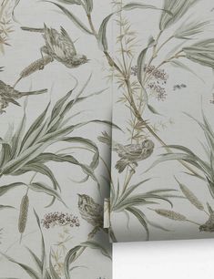 two wallpapers with birds and flowers on them, one in grey and the other in green