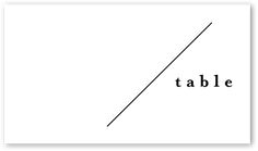 a black and white photo with the word table written in cursive font on it