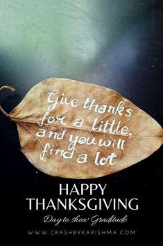 a leaf with the words happy thanksgiving written on it