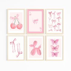 four pink prints with butterflies, cherries and bows on them are hanging on the wall