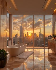 a bath tub sitting in the middle of a bathroom next to a large glass window