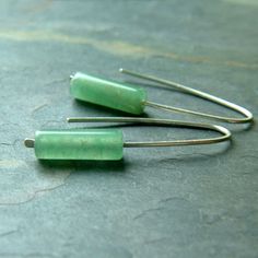 "Sterling silver modern minimalist open hoop dangles. Sterling silver handmade ear wires with mossy green aventurine cylinder beads. The soft green shades of the aventurine combines with the sterling silver for a sleek modern look. These aventurine open hoop earrings are approximately 1 1/4\" long. They come gift boxed and ready for giving (or keeping). ;) To get to my shop's main page: http://www.etsy.com/shop/ArtistiKat Thanks for shopping hand made.. PLEASE read shop policies prior to purchas Aventurine Earrings, Ear Threader, Wire Jewelry Tutorial, Unique Jewelry Gifts, Diy Bracelet Designs, Open Hoop Earrings, Jewelry Techniques, Earrings Green