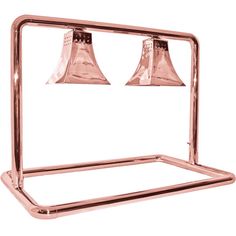 two bells are mounted to the side of a metal rack on a white background,