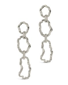 You don't want to blend in, and these bold drop earrings will help you stand out! These feature a trio of organic molten links that secure with a sturdy post back. Available in gold and silver tones. Materials: 14K gold or rhodium plated brass Features: 2" drop, 0.45" width, 0.4" stud, Lead & Nickel free, post back Modern Oval Link Metal Earrings, Modern Link Shaped Metal Earrings, Tarnish Resistant Silver Chain Link Earrings, Molten Metal, Solid Gold Bracelet, Metal Drop, Pearl Chain Necklace, Necklace And Bracelet Set, Statement Drop Earrings