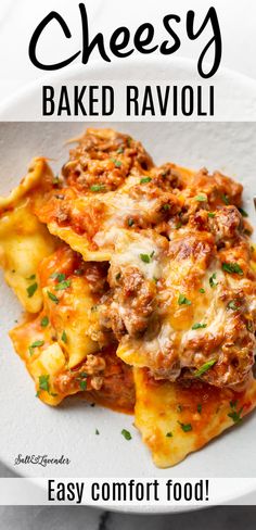 cheesy baked ravioli on a white plate with text overlay that reads easy comfort food