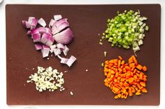 chopped up vegetables are on a cutting board