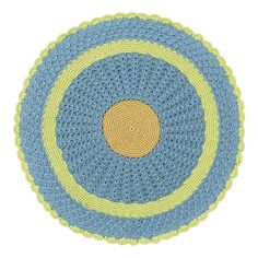 a blue and yellow crocheted placemat on a white background