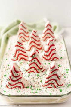 small christmas trees in a glass dish with sprinkles