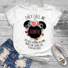 aunt disney shirt, they call me auntie because partner in crime makes me sound like a bad influence shirt, floral, flowers by Mamapower on Etsy https://www.etsy.com/listing/711676607/aunt-disney-shirt-they-call-me-auntie Aunt Clothes, Aunt Stuff, Mickey Shirts, Auntie Anne, Ti Shirt, Aunt Shirt, Aunt T Shirts, Aunt Life, Auntie Shirts