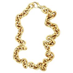 This bright and weighty 18K yellow gold oval link necklace from the 1970s is designed for versatility, converting seamlessly into a shorter necklace and a bracelet. The high-polish oval links measure 18 mm in width, reflecting light beautifully and adding a touch of elegance. The full-length necklace measures 26 inches, while the convertible options include a shorter 17.5-inch necklace and an 8.5-inch bracelet, providing multiple styling possibilities. Stamped with the Italian "750” hallmark and Reflecting Light, 18k Gold Necklace, Length Necklace, Fine Jewelry Collection, Short Necklace, Link Necklace, Bracelet Set, Long Necklace, Necklaces Bracelets