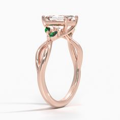 Emerald Cut Willow Engagement Ring With Lab Emerald Accents - 14K Rose Gold. Wispy vines of precious metal entwine towards lustrous marquise-shaped lab grown emerald buds in this nature-inspired trellis ring. Elegant Rose Gold Emerald Ring With Accent Stones, Elegant Rose Gold Emerald Ring With Brilliant Cut, Lab Created Emerald, Brilliant Earth, Precious Metal, Emerald Cut, Nature Inspired, Precious Metals, Lab Grown