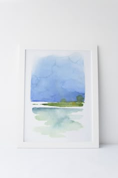 a watercolor painting with blue and green colors