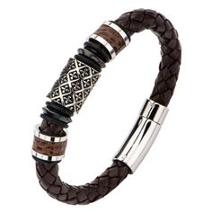 Tap into your regal side with THE SAINT BRACELET, a braided brown leather mens bracelet with a stainless steel bead carved with the royal fleur-de-lys symbol. Saint Bracelet, Leather Mens Bracelet, Cool Mens Bracelets, Men Bracelets, Brown Accessories, Silver Chain For Men, Brown Leather Bracelet, Men's Bracelets, Skull Bracelet