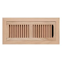 a wooden vent cover on a white wall