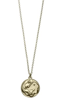 a gold necklace with a woman's face in the shape of a coin on a chain