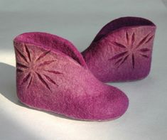 Felted children slippers in beautiful lavender color - excellent gift for birthday or housewarming. Can by made for baby or toddler. Non-slip sole is covered with natural latex. Felt is a perfect material for footwear, especially for children. It is wear proof and warm. The little one's feet will not get cold or overheat. My little sons are running around in felted slippers all day long. Slippers can be ordered in any children size. It usually takes 5-7 workdays to make them and 1-3 weeks to shi Gift Booties With Rubber Sole And Round Toe, Gift Rubber Sole Round Toe Booties, Pink Booties With Soft Sole For Gift, Handmade Round Toe Slippers For Gifts, Pink Booties With Soft Sole As Gift, Comfortable Round Toe Booties As Gift, Comfortable Purple Round Toe Slippers, Handmade Closed Toe Slippers As Gift, Pink Booties With Round Toe As Gift